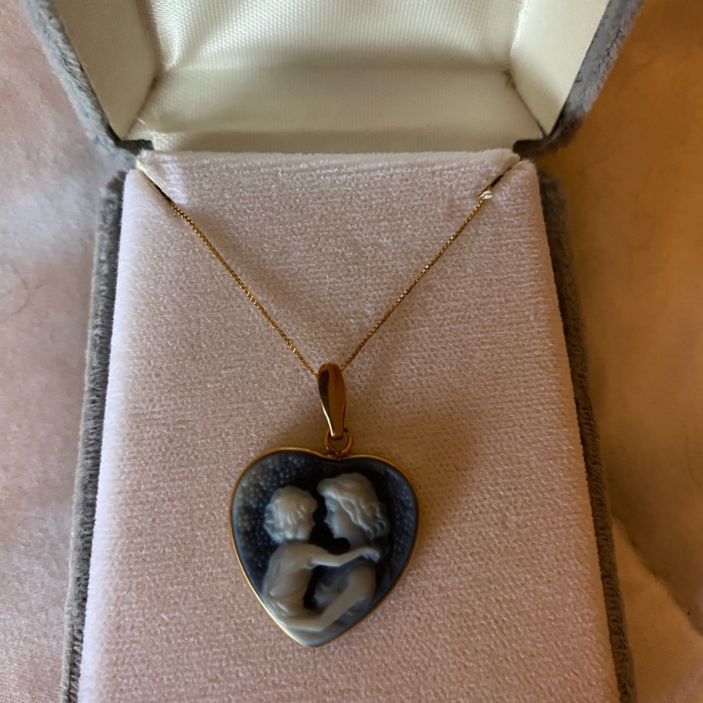Gold Necklace with baby and mom never worn